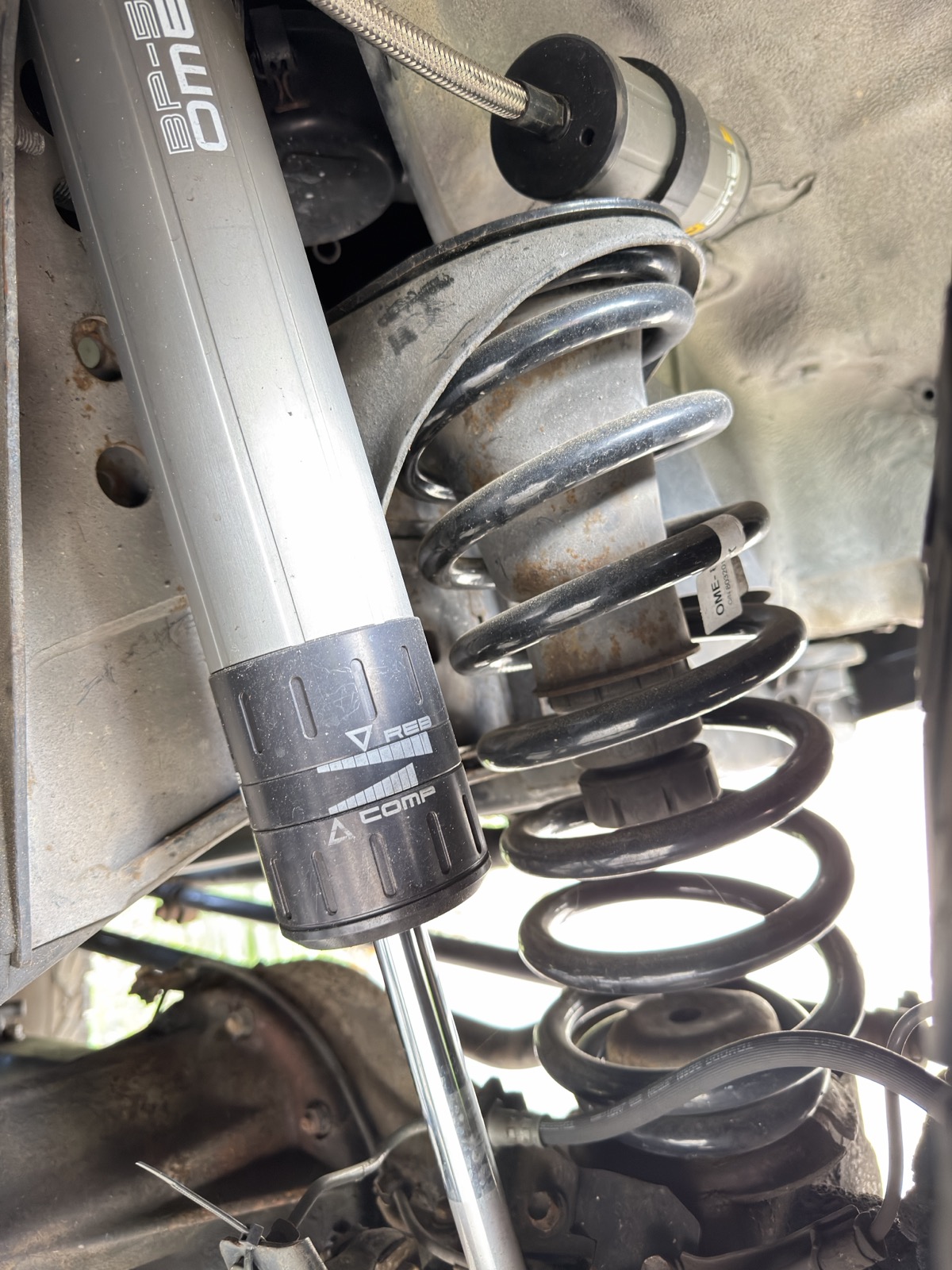 Coil spring suspension shock absorber, close-up